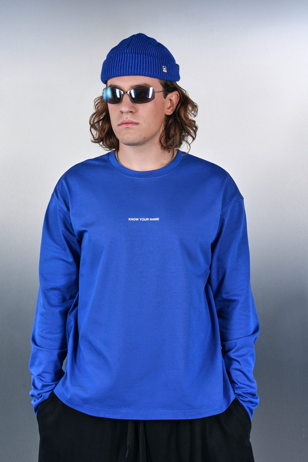 Blue KYN long sleeve with the Know Your Name print